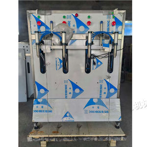 Máquina de llenado de émbolo de cuatro cabezales de doble cabezal Máquina de llenado automático de botellas de líquido viscoso/pasta - Product Image 1