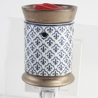 Chauffe-cire à brancher sous marque privée |   Diffuseur de parfum en céramique pour prise murale |   Diffuseur de cire électrique pour veilleuse
