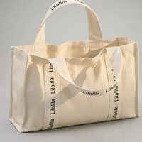 Sac fourre-tout en toile personnalisé avec logo OEM, robuste, 16 oz, réutilisable, en coton, avec sangle en sangle imprimée et poche intérieure
