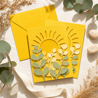 Carte de vœux personnalisée 2027 en carton jaune soleil, avec motif feuille de soleil en fibre végétale superposé, gaufrée, impression de logo OEM