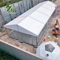 Grande tente de stockage de type marquise d'extérieur avec parois en ABS pour la location de fêtes