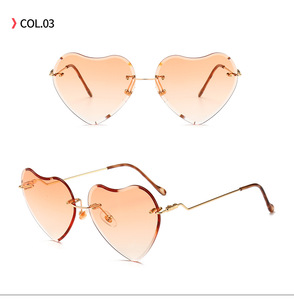 <span class=keywords><strong>Occhiali</strong></span> <span class=keywords><strong>da</strong></span> <span class=keywords><strong>sole</strong></span> <span class=keywords><strong>donna</strong></span> alla moda senza montatura cuore blu rosso giallo viola con montature leggere - Product Image 4