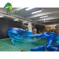Modèle gonflable publicitaire en forme de dauphin, décoratif, transparent bleu en PVC, pour fêtes LED 2026