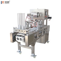 Machine automatique de cachetage de tasse de yaourt et de jus de petite taille Machine de conditionnement multifonctionnelle de tasse en plastique pour des usines