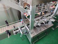 Machine automatique de cachetage de rouleau de film d'aluminium de tasse de bouteille de seau de pot de quatre têtes
