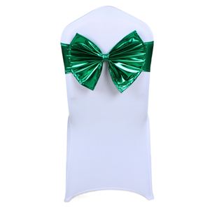 Ensemble d'accessoires haut de gamme : Housse de chaise nœud papillon enduite avec ruban de soie pour célébrations hôtelières - Product Image 1