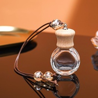 Vente en gros bouteille de diffuseur vide de voiture unique de luxe de haute qualité 6ml 8ml 10ml bouteille de parfum de voiture en bois suspendue