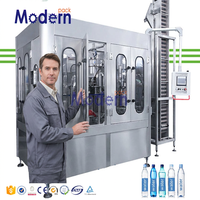 Machine de remplissage d'eau électrique automatique haute précision Modernpack PLC, précision 99,9 % pour les industries agroalimentaires et des boissons