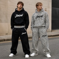 Ensemble de survêtement 2 pièces pour homme : sweat à capuche zippé et pantalon large gris et noir contrastant, coupe oversize et ample avec bord côtelé