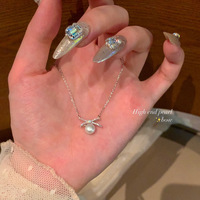 Accessoires de mode, collier en alliage romantique avec pendentif en forme de nœud, imitation perle, bijoux classiques pour femmes
