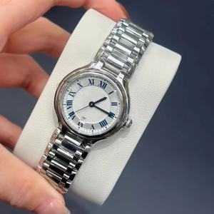 Élégant et classique, index des heures sertis de diamants, mouvement à quartz précis en acier inoxydable, affichage de la date, cadran multicolore - Product Image 4
