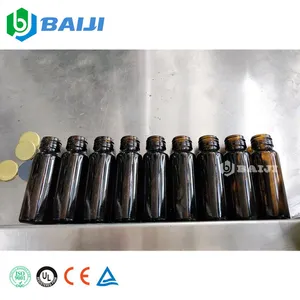 Industry automatic glass bottle syrup oral liquid filling capping and sealing machine production line