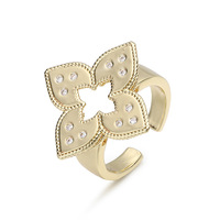 Bague de fiançailles exquise et luxueuse en cuivre incrusté de zircon, motif trèfle à quatre feuilles ajouré pour femme - Cadeau haut de gamme à l'effigie d'un pétale de fleur