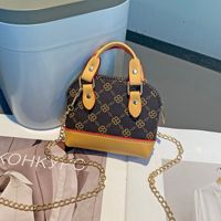 Tas Mini Kulit PU Mewah 2026 Gantungan Kunci Dompet Koin Liontin Pola Kartun Desainer Baru Hadiah Bentuk Oval Hari April Mop