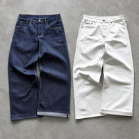 Jean en denim TaiDe sur mesure, coupe ample à jambe large, noir et blanc, plissé à l'avant, ourlet fendu, fabricant de vêtements OEM ODM avec assurance commerciale