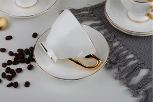 Service à café en céramique européen 15 pièces, couleur unie, en porcelaine fine, comprenant tasses, pot, laitière, sucrier et soucoupes - Couleur naturelle - Product Image 4