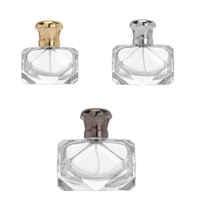 Elegante <span class=keywords><strong>Alien</strong></span> <span class=keywords><strong>Perfume</strong></span> Botellas de vidrio 30ml 50ml 100mL Diseño irregular con aleación Tapa de zinc Bomba Pulverizador OEM Embalaje personalizable - Product Image 1