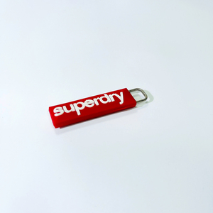 Tirette de fermeture à glissière en silicone durable avec accessoire de chapeau Easy Zip Motion avec patch en caoutchouc durable - Product Image 1