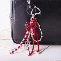 Breloque de sac Y2K tendance avec nœud cœur rouge et chaîne perlée argentée, accessoire pour sac à main femme