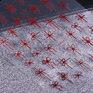 Autocollants pour ongles en forme de nœud cadeau de Noël, 3 couleurs, or métallique, vert, <span class=keywords><strong>rouge</strong></span>, design simple en ruban, bricolage, autocollants pour <span class=keywords><strong>manucure</strong></span>, décorations de vacances - Product Image 3