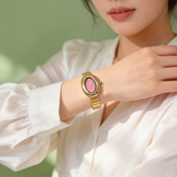 Montre-bracelet de luxe ovale dorée pour femme à quartz, bracelet en métal poli lisse, cadran simple à chiffres romains, pour le quotidien et les soirées