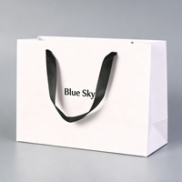 Sac cadeau en papier blanc personnalisé OEM/ODM, emballage de boutique personnalisé, sac en papier d'art de luxe pour bijoux, vêtements, cosmétiques