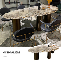 Hochwertiger Esstisch mit Edelstahlgestell in Ovaler Form Elegante Luxus-Designs Marmor-Esstische