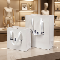 Sac en papier blanc de luxe pour emballage de bijoux de boutique de cosmétiques avec logo de marque personnalisé