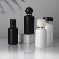 Flacons de parfum vides cylindriques noirs et blancs de luxe 50 ml 100 ml avec pulvérisateur à pompe rechargeable pour huiles essentielles et parfums