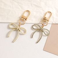 Accessoires de sac personnalisés : Pendentif pour sac et téléphone portable en alliage de zinc, style mode délicat avec strass et nœud