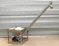Prix usine Machine d'alimentation à vis inclinée en acier inoxydable / Convoyeur à vis hélicoïdal Économiseur d'espace Élévateur spiralé pour granulés et poudres Haute performance