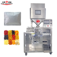 Automatische verpakkingsmachine voor zakjes met snacks, dubbelkopige elektronische weegschaal, zakjesafsluitmachine