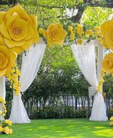 Arche de fleurs géante en organza rose rêveur, faite sur mesure, pour la décoration de cérémonie, de fête ou d'événement