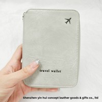 Portefeuille de voyage en cuir PU avec fermeture éclair, grande capacité, pour billets d'avion, cartes et passeports, impression de logo, imperméable et durable