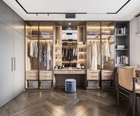 Armoire de chambre en bois au design moderne et épuré, avec 4 portes, pour femme, servant également de coiffeuse et de rangement.