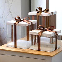 Boîte à gâteau transparente en papier avec couvercle blanc et ruban