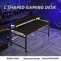 Bureau de jeu ergonomique en métal moderne en forme de L pour ordinateur PC - Grande table de jeu rose et noire pour usage en villa