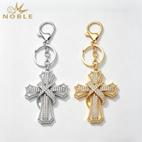 Porte-clés croix en alliage de zinc noble, design nœud papillon avec strass transparents, pendentif religieux, breloque de sac bicolore argent et or