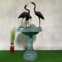 Sculpture de fontaine en bronze sur mesure en forme d'héron, technique de moulage, couleur et taille personnalisables pour la décoration de jardin extérieur