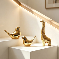 Ornement de bureau moderne de luxe en céramique dorée, motif oiseau et girafe, surface électroplaquée, pour la décoration intérieure de la maison, de l'hôtel, du café, ou comme cadeau.