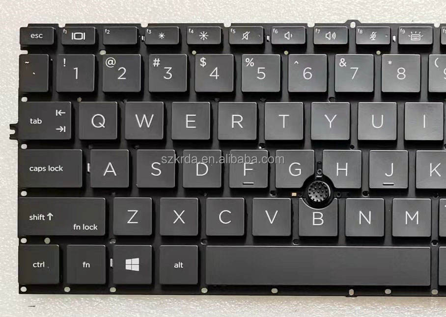 英語とロシア語のレイアウトを備えたHPグレーのラップトップ