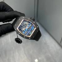 Montre de haute qualité RM 055 en fibre de carbone noire et dorée, les engrenages tournent, le volant oscillant tourne, revêtement bleu, étanche