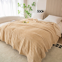 Vente en gros couverture flanelle jacquard côtelée, douce fausse fourrure polaire pour canapé lit déco, OEM ODM personnalisable.