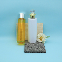 Flacon cosmétique PET haut de gamme, contenant de luxe pour soins de la peau avec couvercle en diamants de cristal pour l'emballage de lotion et d'essence
