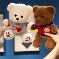 Ours en peluche confortable de 30 cm, assis, en peluche moelleuse, recouvert d'un pull, ours en peluche en forme de cœur pour la Saint-Valentin