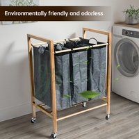 Panier à linge en bambou de grande capacité autoportant avec roues et sacs de rangement imperméables amovibles pour la salle de bain à domicile