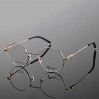 Montura redonda de gafas de titanio, hecha a medida, estilo retro, con 3 colores