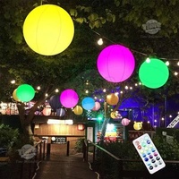 Ballon gonflable géant LED extérieur personnalisé de 1m 2m, étanche, imprimé RGB UV, durable, pour divertissement aquatique