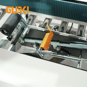 Высокоскоростной автоматический упаковщик коробок GURKI с регулируемой верхней и нижней лентой для картонных коробок, упаковки одежды и деревянных изделий - Product Image 2