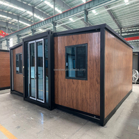 Maison conteneur de luxe pliable et extensible à deux étages et deux ailes, mobile et anti-cyclone